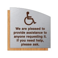 ADA We Are Pleased To Provide Assistance Sign - Brushed Aluminum & Wood Laminates with Engraved Wheelchair Symbol and Text | STOPSignsAndMore.com