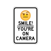 Smile! You're On Camera Signs for Sale with Raised Eyebrow Emoji - 12x18 - Made with Reflective Rust-Free Heavy Gauge Durable Aluminum available online for shipping from STOPSignsAndMore.com