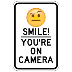 Smile! You're On Camera Signs for Sale with Raised Eyebrow Emoji - 12x18 - Made with Reflective Rust-Free Heavy Gauge Durable Aluminum available online for shipping from STOPSignsAndMore.com